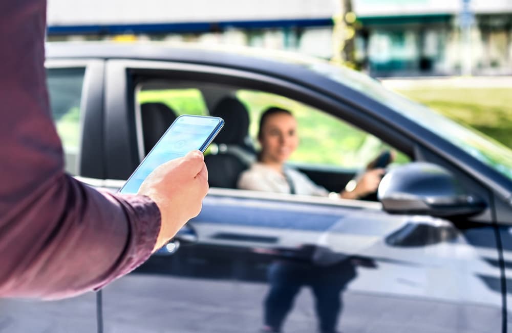 Rideshare car app. Taxi cab driver mobile service in phone.