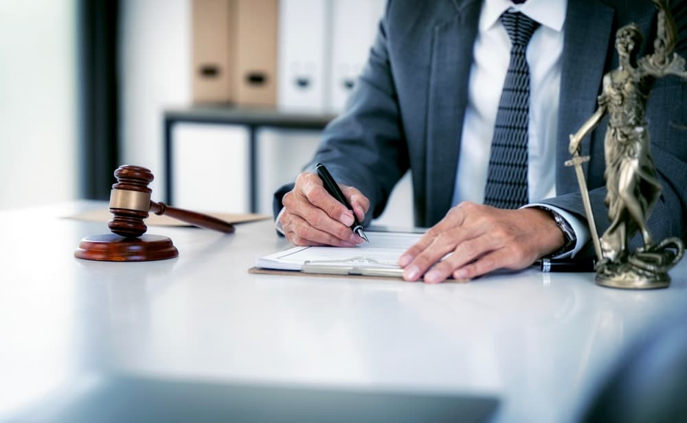 An attorney working on a case in his office